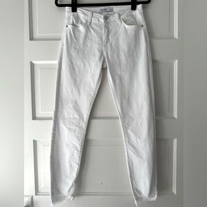 Just Black Denim white skinny jeans with frayed hi-lo hemline